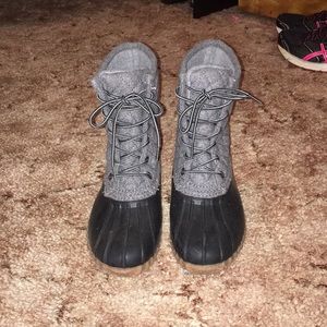 Grey and black duck boots